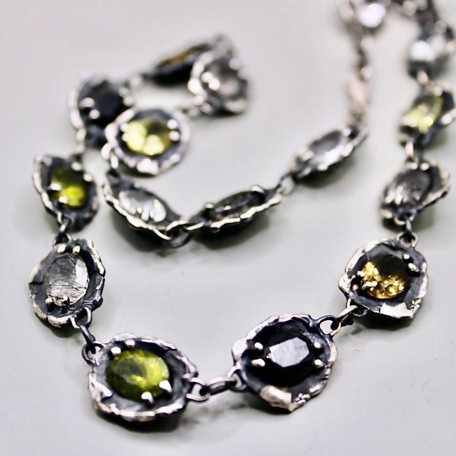 Fall choker necklace with lemon, olive clear, rutile quartz and onyx stones in sterling silver setting