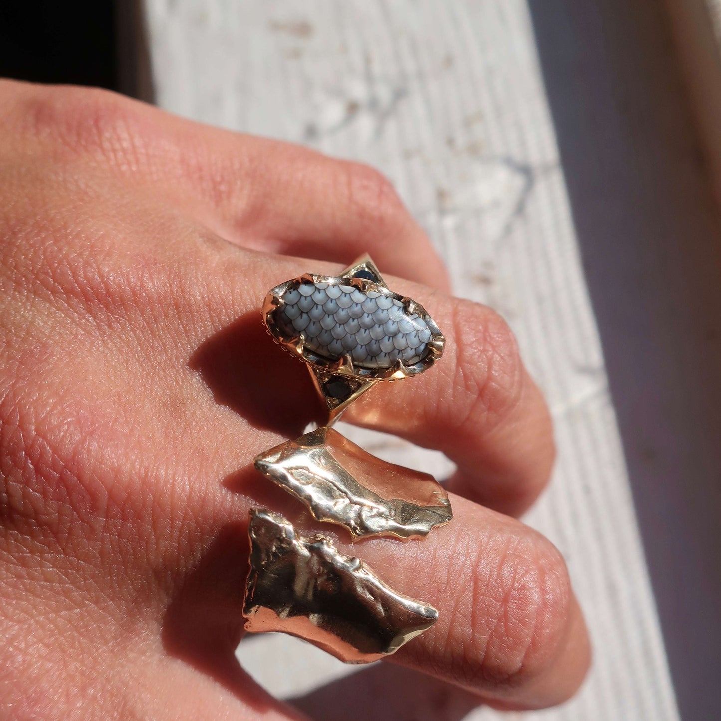 Trench Ring in 14K Gold with Diamonds worn on the hand woth other rings- Mary Gallagher