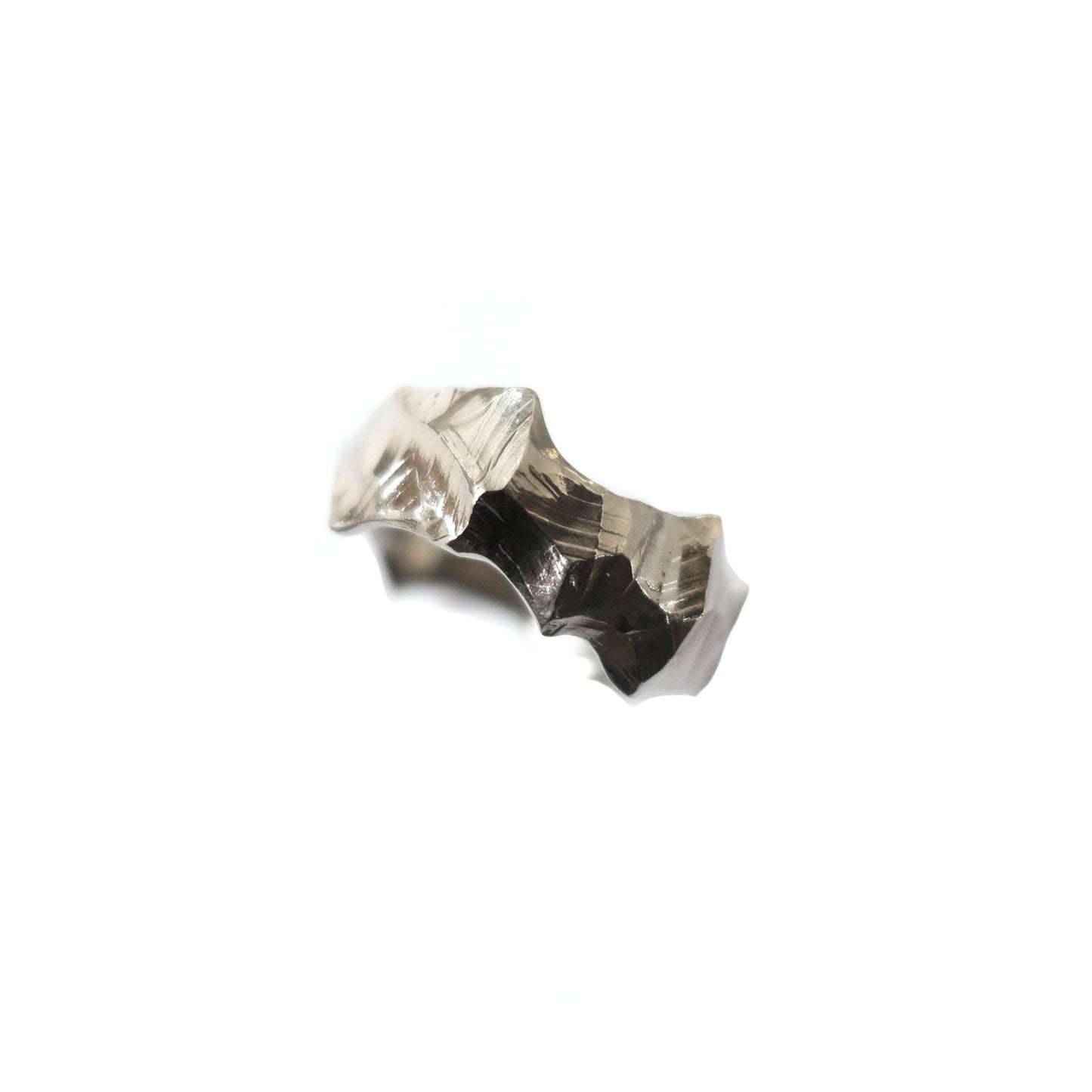 Irregular hand carved silver Formation Ring inspired by coastline and sea wind, unisex design