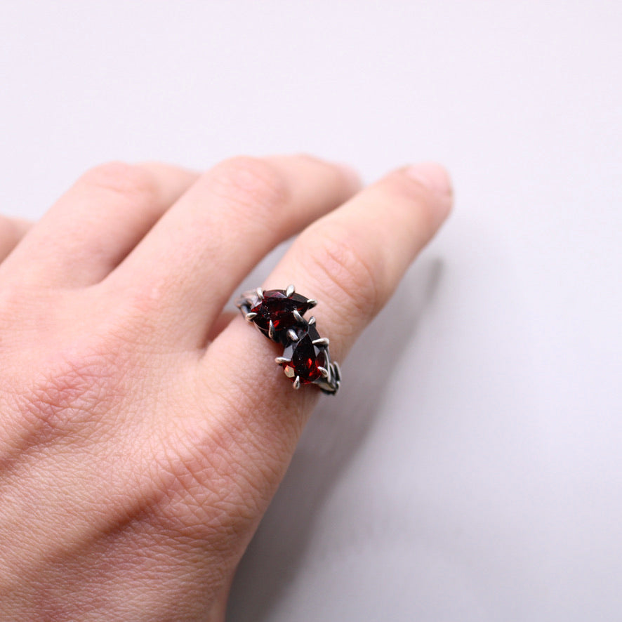 Moi et Toi Pear Ring with Garnet