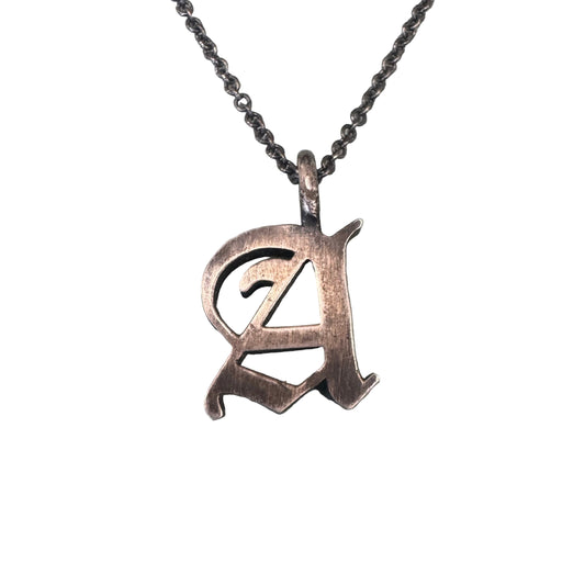 A initial pendant