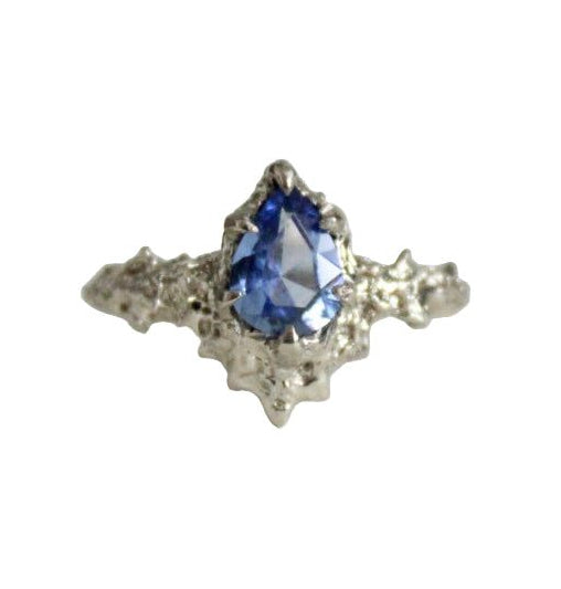 Pear-shaped periwinkle blue sapphire ring in 14k white gold with pointed prongs